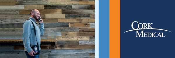 Guy walking with a NPWT Device