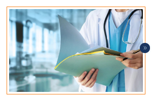 Doctor studying a chart